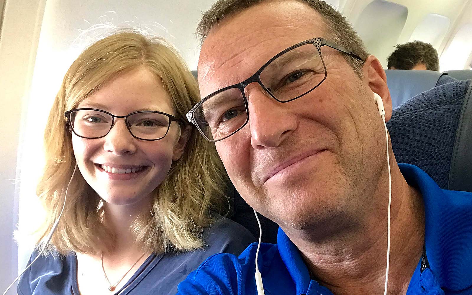 Bruce and Holly Johnson on airplane to Edmonton